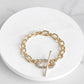Gold Tone Chain Bracelet with pave' toggle clasp