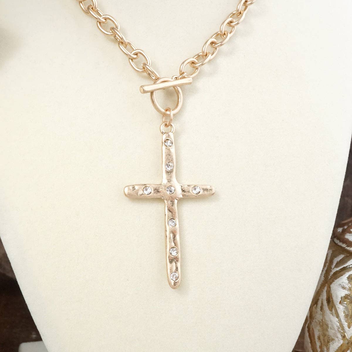 Divine Simplicity – Hammered Cross Front Toggle Necklace: Worn Gold Tone