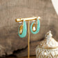 Golden Ember – Sculptural Acrylic Hoop Earrings: Turquoise