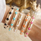 Timeless Charm – Slim Cabochon Eternity Bangle: Pearl
