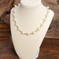 Luminous Orbit – Floating Pearl Station Necklace: Gold