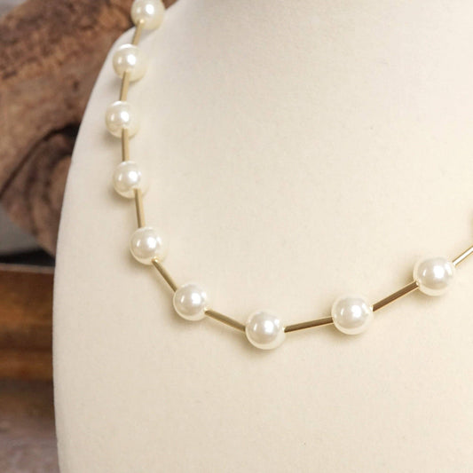 Luminous Orbit – Floating Pearl Station Necklace: Gold