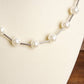 Luminous Orbit – Floating Pearl Station Necklace: Gold