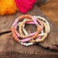 Pink stack of 5 clay and wood beads bracelets in pinks, white and peach