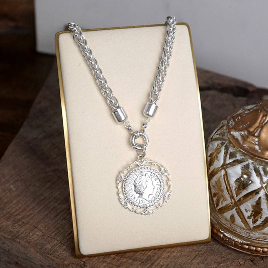 Heirloom Reverie – Ornate Coin Pendant Necklace: Worn Silver Tone